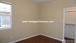 Fort Worth house for rent - A room with a VerdegrisVentures.com watermark on the wall.