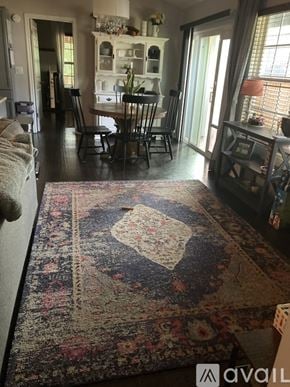 San Antonio apartment for rent - A backyard with a wooden fence and trees.