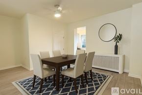 Philadelphia house for rent - A dining room with a table and chairs.