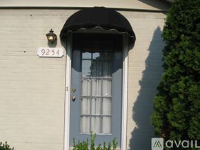 St. Louis house for rent - A house with the number 9254 on the wall above the door.