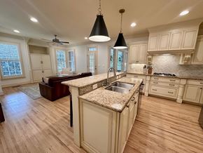 Greer house for rent - A kitchen with a sink and a counter.