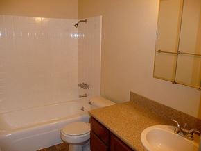 Bellevue apartment for rent - A white toilet sits next to a sink in a bathroom.