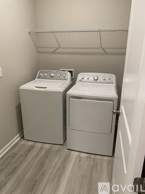 Haines City house for rent - A laundry room with a washer and dryer.