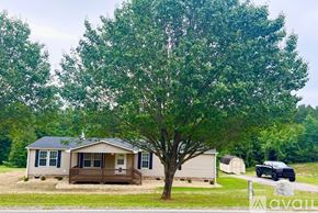 Denver house for rent - A house with a brown roof and a porch.