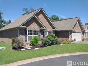 Boiling Springs house for rent - A house with a brown roof and a white garage door.