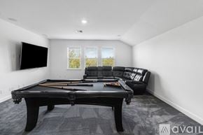Winter Garden house for rent - A modern dining room with a table set for four.