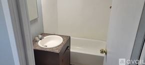 Dublin apartment for rent - A bathroom with a sink and a bathtub.