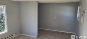 Dublin apartment for rent - A room with grey walls and a window on the left side.