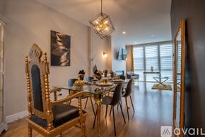 Chicago apartment for rent - A dining room with a large table and chairs.