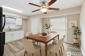 Nashville apartment for rent - A dining room with a wooden table and chairs.