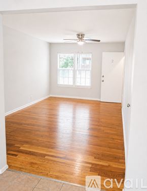 Corpus Christi apartment for rent - A white bathroom with a shower and a glass door.