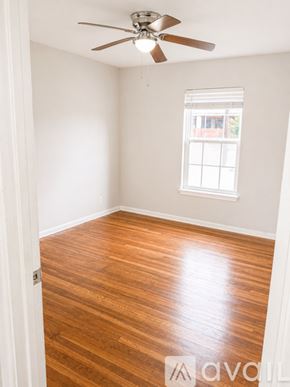 Corpus Christi apartment for rent - A kitchen with white appliances and cabinets.