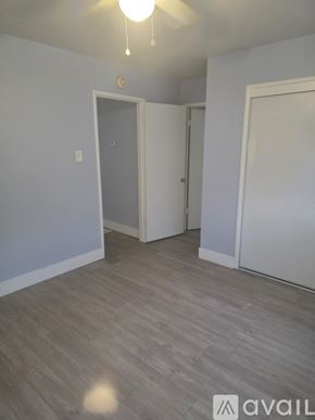 Roseville apartment for rent - A room with a grey floor and white walls.