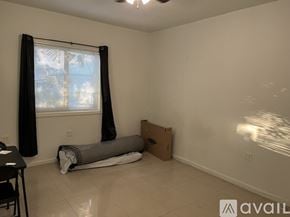 Miami apartment for rent - A white appliance with a Titan sticker on the front.
