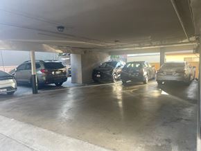 Valley Village apartment for rent - A parking garage with several cars parked in it.