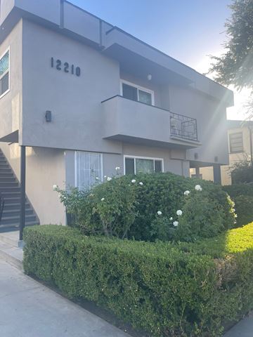 Valley Village apartment for rent - A building with the number 12210 on it.