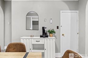 Sturgis apartment for rent - A room with a carpeted floor and a door leading to another room.