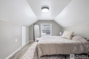 Sturgis apartment for rent - A room with a grey floor and a white door.