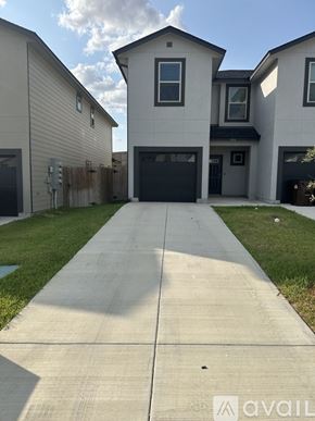San Antonio townhouse for rent - A house with a driveway in front of it.