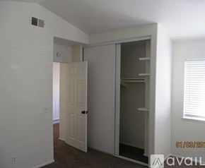 Palmdale house for rent - A patio with two chairs and a table is available for rent.