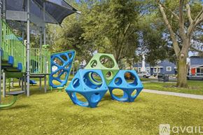 St. Petersburg apartment for rent - A playground with blue and green play structures.
