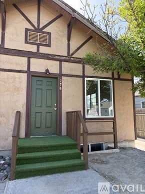 Twin Falls apartment for rent - A small house with a brown door and a brown roof.