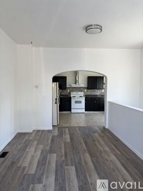 Twin Falls apartment for rent - A white closet with a mirrored door is open to a bathroom.