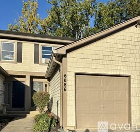 Indianapolis house for rent - A house with the number 6086 on the garage door.