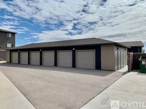 Box Elder apartment for rent - A large garage with multiple doors is available for rent.