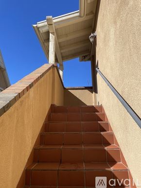 San Ramon house for rent - A staircase with a beige wall and a white roof.