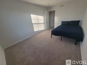 Granville house for rent - A modern dining room with a dark wood table and chairs.