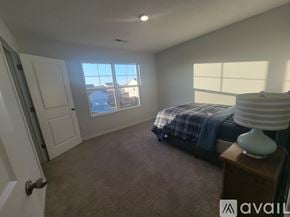 Granville house for rent - A modern kitchen with a dining table set for four.