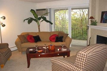 Cincinnati apartment for rent - a living room with a couch and a coffee table