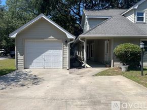 Mount Pleasant house for rent - A two-car garage is attached to a house.