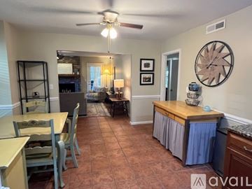 Mount Pleasant house for rent - A living room with a dining table and chairs.