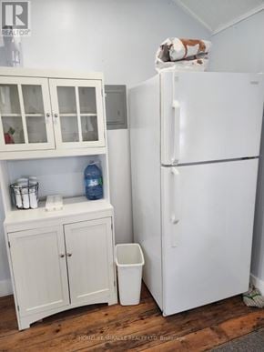 Chatham-Kent (Blenheim) house for rent - A white fridge with a white cabinet and a white trash can.