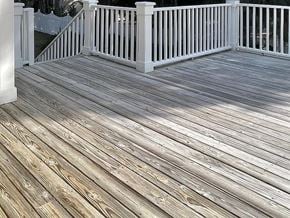 Pawleys Island house for rent - A wooden deck with a white railing.