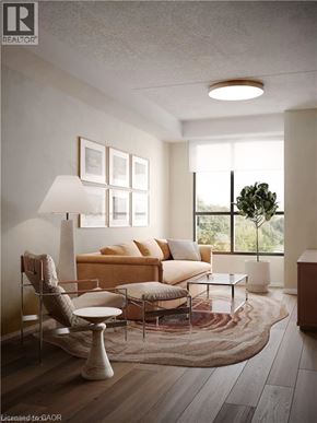 Waterloo condo for rent - A modern living room with a sofa, chair, and lamp.