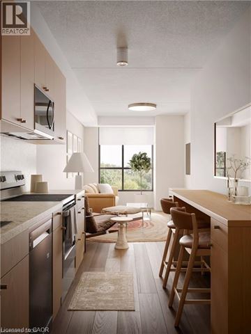Waterloo condo for rent - A modern kitchen with wooden cabinets and a large island.