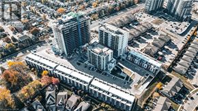 Kitchener condo for rent - A cityscape with a mix of modern and traditional architecture.