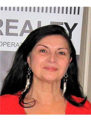 INDIRA ZUKAN, ROYAL LEPAGE WOLLE REALTY