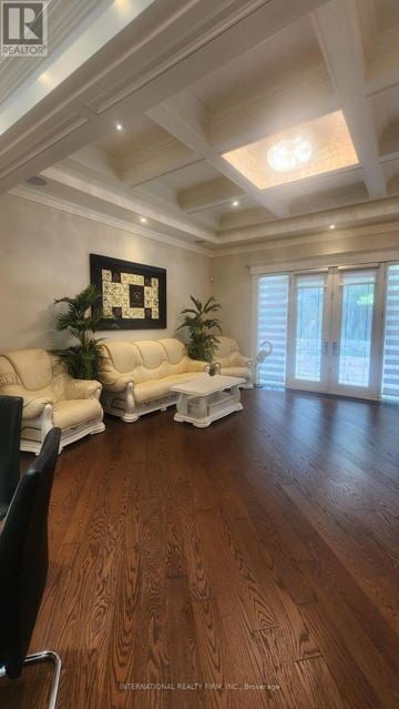 Toronto (Stonegate-Queensway) house for rent - A living room with a white sofa and a wooden floor.