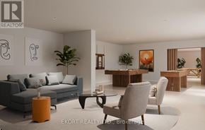 Belleville (Thurlow Ward) house for rent - A modern living room with a grey sofa, a coffee table, and a dining table with chairs.