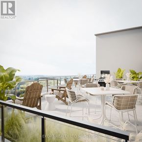 Belleville (Thurlow Ward) house for rent - A balcony with chairs and a table overlooking a scenic view.