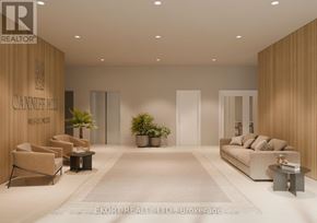 Belleville (Thurlow Ward) house for rent - A modern living room with a reception desk and chairs.