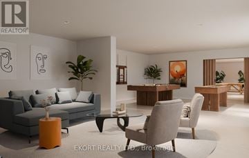 Belleville (Thurlow Ward) house for rent - A modern living room with a grey sofa, a coffee table, and a dining table with chairs.
