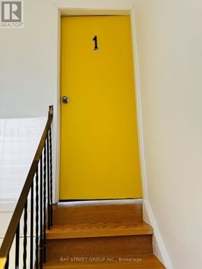 Oshawa (Lakeview) house for rent - A yellow door with the number 1 on it.