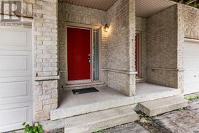 Waterloo townhouse for rent - A red door is on the left side of a white door.