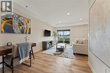 Mcgregor apartment for rent - A living room with a couch, chair, and a painting on the wall.