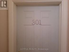 For rent in Prescott - A white door with the number 301 on it.
